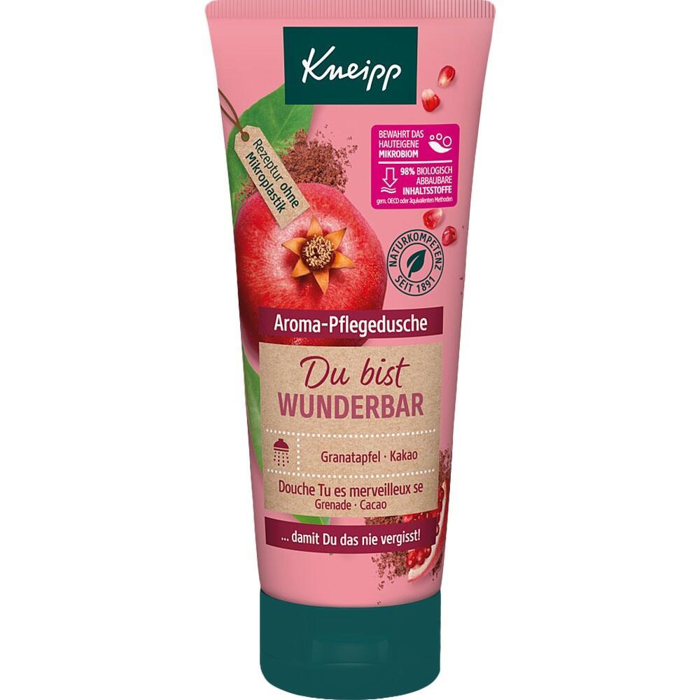 Eine pinke Flasche Kneipp Duschgel mit Granatapfel- und Kakao-Duft.